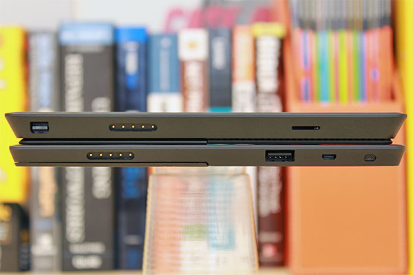 Port layout of the two devices is quite different on the right side. The Surface Pro has (from left) a mini-DisplayPort, power port, and a microSDXC card slot. The Surface RT's micro HDMI terminal is towards the far right in this picture; that means when it's standing, the port is nearer to the top. Port layout of the two devices is quite different on the right side. The Surface Pro has (from left) a mini-DisplayPort, power port, and a microSDXC card slot. The Surface RT's micro HDMI terminal is towards the far right in this picture; that means when it's standing, the port is nearer to the top.